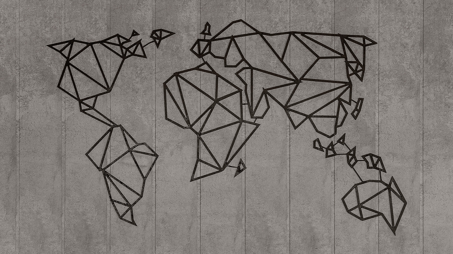 A geometric map of the world hanging on a concrete wall