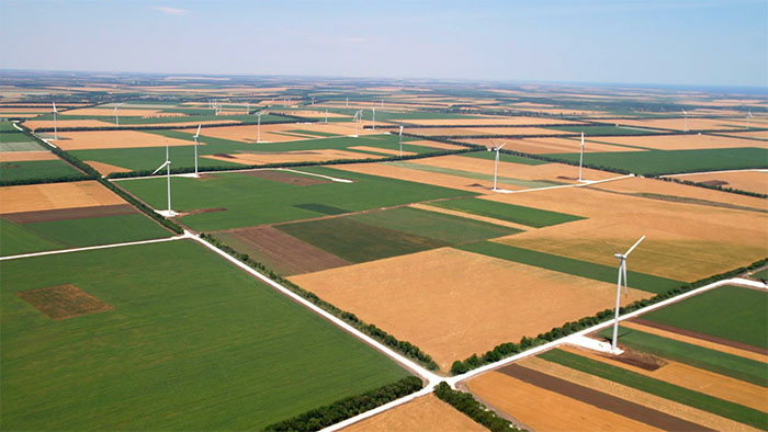 The wind turbines across the farmland in the Saint Nikola Wind Farm in Bulgaria.