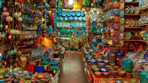 Photo of a souvenir shop in Morocco, filled with a variety of souvenirs.